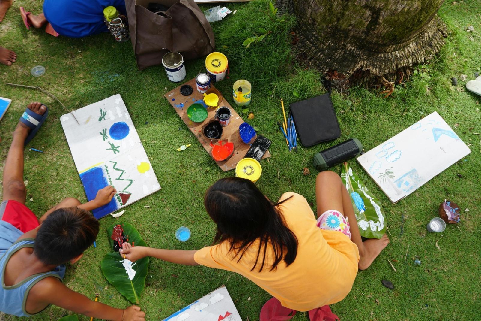 Student working on illustration project with drawing tablet